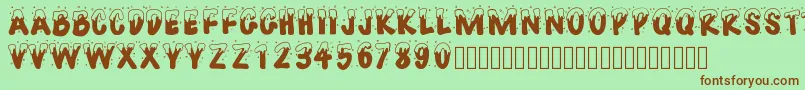 Pwhappychristmas Font – Brown Fonts on Green Background