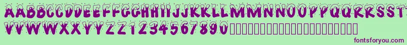 Pwhappychristmas Font – Purple Fonts on Green Background