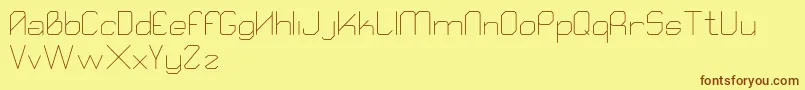 Qube Font – Brown Fonts on Yellow Background