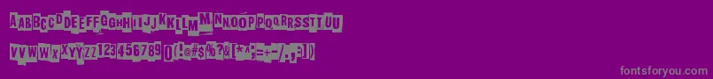 SlaveOnlyDreamsToBeKing-fontti – harmaat kirjasimet violetilla taustalla