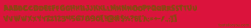 フォントGoblincreekrotate – 赤い背景に茶色の文字
