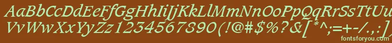 CaxtonLtBookItalic-fontti – vihreät fontit ruskealla taustalla