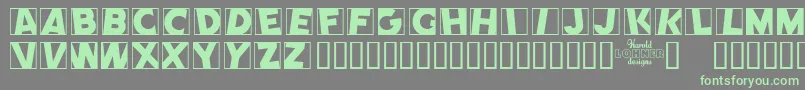 Comep Font – Green Fonts on Gray Background