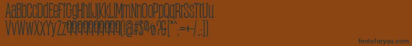 フォントObcecadaSerifBoldFfp – 黒い文字が茶色の背景にあります