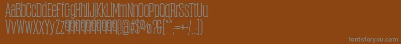 Lisätietoja ObcecadaSerifBoldFfp-fontista ObcecadaSerifBoldFfp-fontti – harmaat kirjasimet ruskealla taustalla