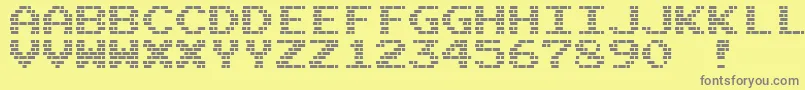 フォントM10BattleCities – 黄色の背景に灰色の文字
