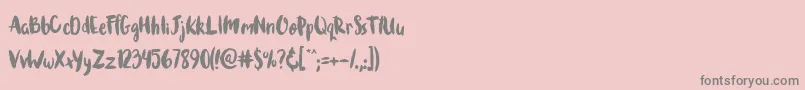 Brushcheetah-Schriftart – Graue Schriften auf rosa Hintergrund