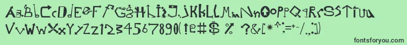 Strelochnikc Font – Black Fonts on Green Background