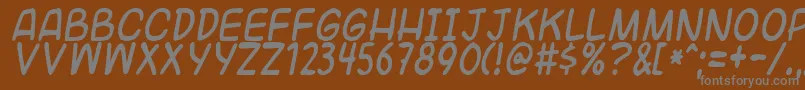 フォントUniversalfruitcake – 茶色の背景に灰色の文字
