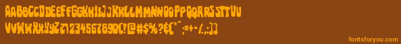 フォントPocketmonstermangle – オレンジ色の文字が茶色の背景にあります。