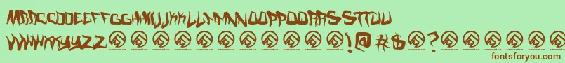 Fonte Fmcreepmode – fontes marrons em um fundo verde