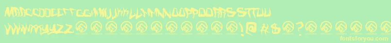 Fonte Fmcreepmode – fontes amarelas em um fundo verde