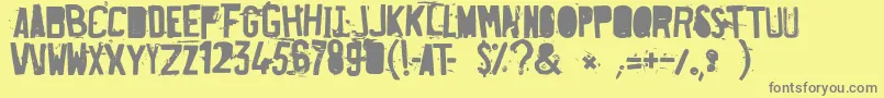 FuckedPlate-Schriftart – Graue Schriften auf gelbem Hintergrund