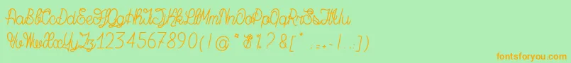 MagicBeanSalade Font – Orange Fonts on Green Background