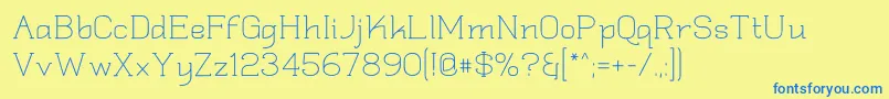 Quadlate Font – Blue Fonts on Yellow Background