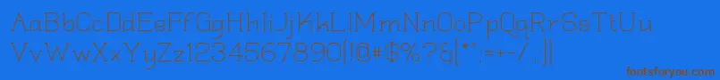 Quadlate Font – Brown Fonts on Blue Background