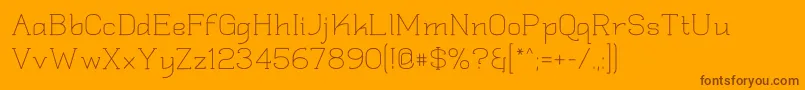 Quadlate Font – Brown Fonts on Orange Background