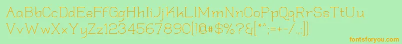 Quadlate Font – Orange Fonts on Green Background