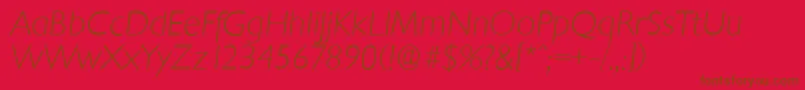 ChantillyserialXlightItalic-fontti – ruskeat fontit punaisella taustalla