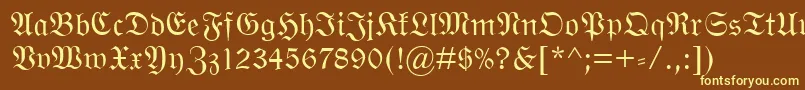 WittenbergerFraktMt-fontti – keltaiset fontit ruskealla taustalla