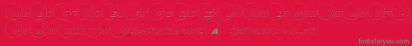 フォントDotcomo – 赤い背景に灰色の文字