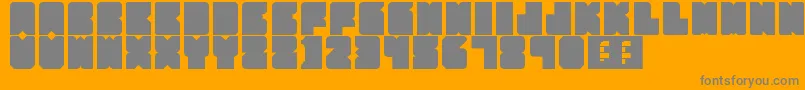 PartyHard-fontti – harmaat kirjasimet oranssilla taustalla