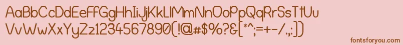 AlphaRomanieG98-Schriftart – Braune Schriften auf rosa Hintergrund