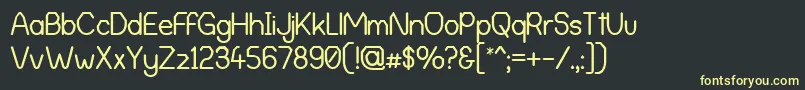 AlphaRomanieG98 Font – Yellow Fonts on Black Background