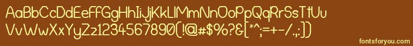 AlphaRomanieG98 Font – Yellow Fonts on Brown Background