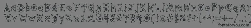 CropCircles-Schriftart – Schwarze Schriften auf grauem Hintergrund