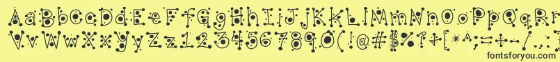 CropCircles Font – Black Fonts on Yellow Background