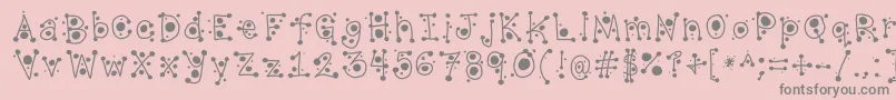 フォントCropCircles – ピンクの背景に灰色の文字