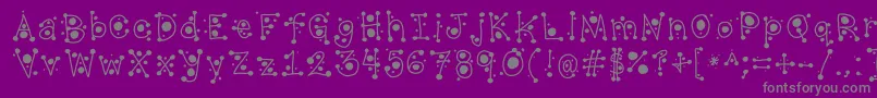 CropCircles-Schriftart – Graue Schriften auf violettem Hintergrund