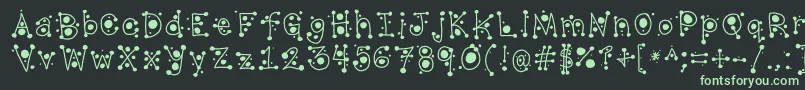 フォントCropCircles – 黒い背景に緑の文字