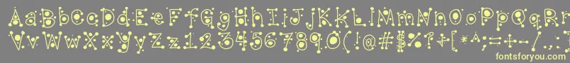 CropCircles Font – Yellow Fonts on Gray Background