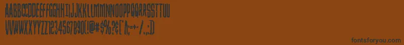 Czcionka Strangerdangercond – czarne czcionki na brązowym tle