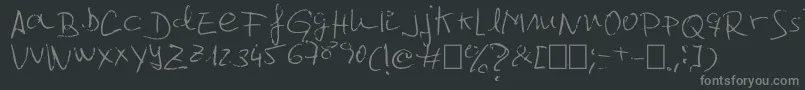 Jcgr61-fontti – harmaat kirjasimet mustalla taustalla