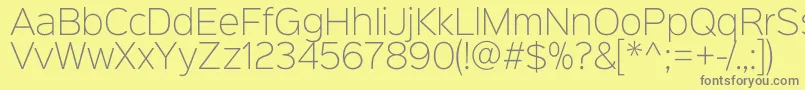 Czcionka Sinkinsans200xlight – szare czcionki na żółtym tle
