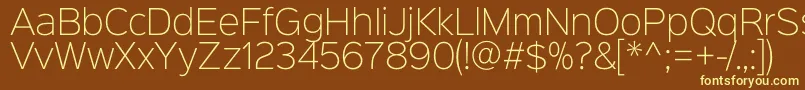 Sinkinsans200xlight-fontti – keltaiset fontit ruskealla taustalla