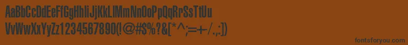 Fonte Aglettericaultracompressedc – fontes pretas em um fundo marrom