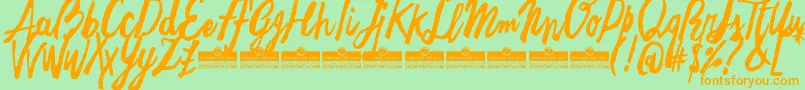 FreehandBrushEasyTrial Font – Orange Fonts on Green Background