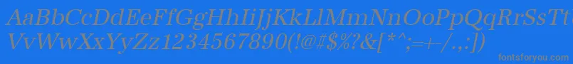 フォントUrwantiquatnarOblique – 青い背景に灰色の文字