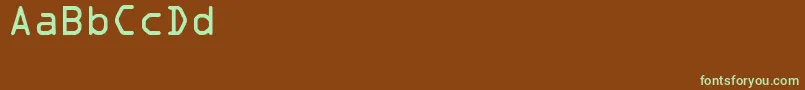 Czcionka Sadvocra – zielone czcionki na brązowym tle