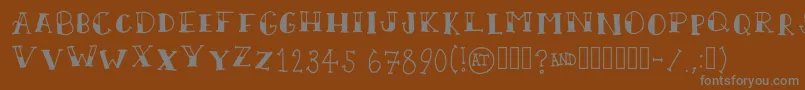 ScallywagRegular Font – Gray Fonts on Brown Background