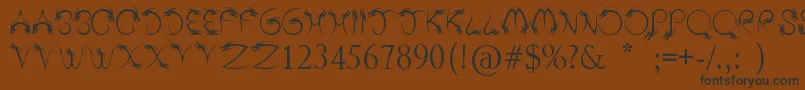 TribalDragon Font – Black Fonts on Brown Background
