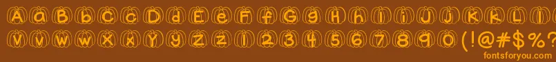 Czcionka Hellopumpkin – pomarańczowe czcionki na brązowym tle