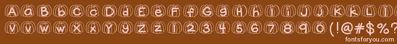 Hellopumpkin-Schriftart – Rosa Schriften auf braunem Hintergrund