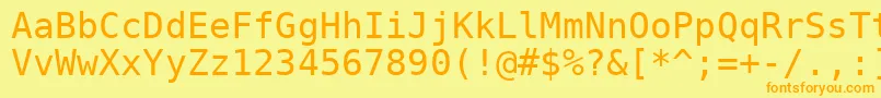 フォントVeramono – オレンジの文字が黄色の背景にあります。