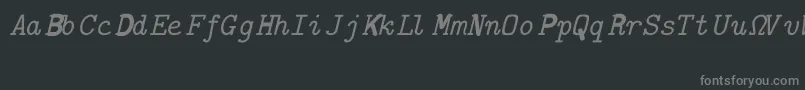 Fonte CmTypewriterItalic – fontes cinzas em um fundo preto