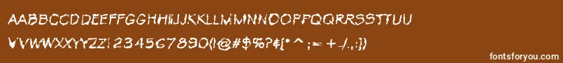 フォントVtcKrinkleKutRegular – 茶色の背景に白い文字